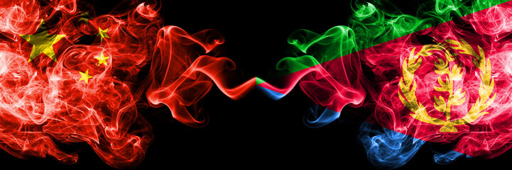 China vs Eritrea smoke flags placed side by side. Thick colored silky smoke flags of Chinese and Eritrea