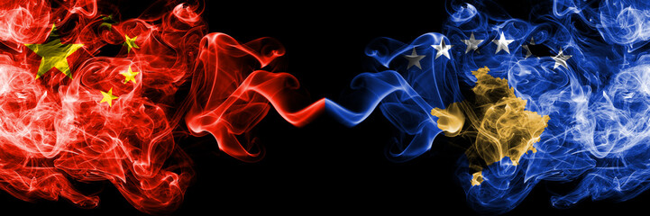 China vs Kosovo, Serbia smoke flags placed side by side. Thick colored silky smoke flags of Chinese and Kosovo, Serbia