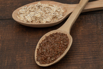 Seeds on a wooden spoon close up