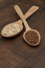 Seeds on a wooden spoon close up