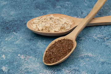 Seeds on a wooden spoon close up