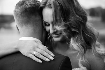 Portrait photos of the couple.Black and white wedding photo close-up