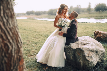 Wedding photos in nature.Beautiful couple