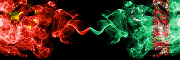 China vs Turkmenistan, Turkmenistans smoke flags placed side by side. Thick colored silky smoke flags of Chinese and Turkmenistan, Turkmenistans