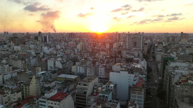 Aerial drone view of city downtown during sunset. Skyscraper buildings panoramic view. Buenos Aires, Argentina.