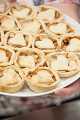 tray of apple tart pasty with a heart shape 