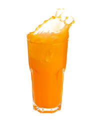 Orange juice splashing out of glass isolated on white background.