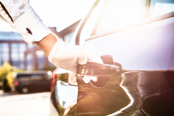 Male Valet Opening Car Door