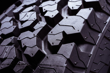 all terrain tire tread black background