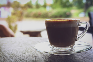 hot latte coffee put on wooden table in cafe restaurant, breakfast in morning day