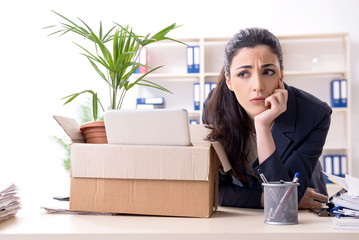 Young female employee being fired from her work