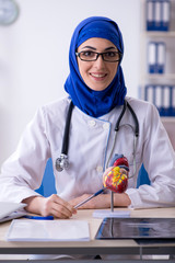Arab female doctor working in the clinic 