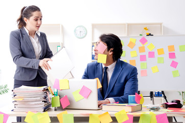 Two colleagues employees working in the office 