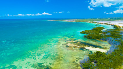 Aerial view of Puerto Rico. Faro Los Morrillos de Cabo Rojo. Playa Sucia beach and Salt lakes in Punta Jaguey. 