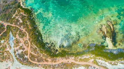 Aerial view of Puerto Rico. Faro Los Morrillos de Cabo Rojo. Playa Sucia beach and Salt lakes in Punta Jaguey. 