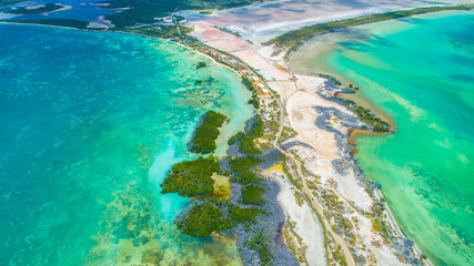 Aerial view of Puerto Rico. Faro Los Morrillos de Cabo Rojo. Playa Sucia beach and Salt lakes in Punta Jaguey. 