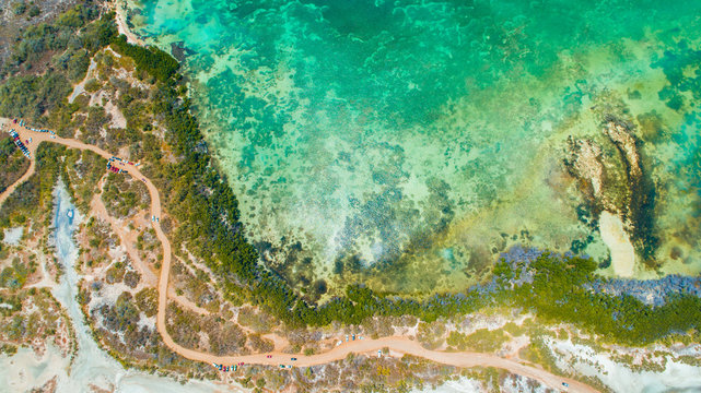 Aerial view of Puerto Rico. Faro Los Morrillos de Cabo Rojo. Playa Sucia beach and Salt lakes in Punta Jaguey. © miami2you