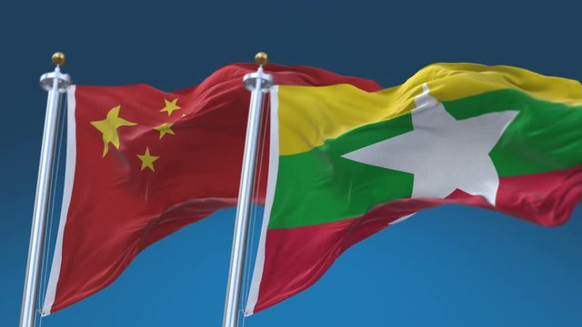 4k Seamless Myanmar and China Flags with blue sky background;A fully digital rendering;The animation loops at 20 seconds;MYA CN.