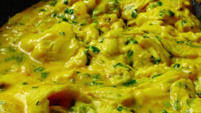 Preparation of omelet on a frying pan. Time lapse.