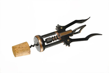 Cork opener and cork on a white background. Corkscrew