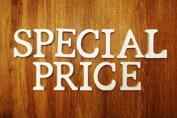 Special Price word alphabet letters on wooden background