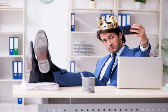 Young king businessman working in the office 