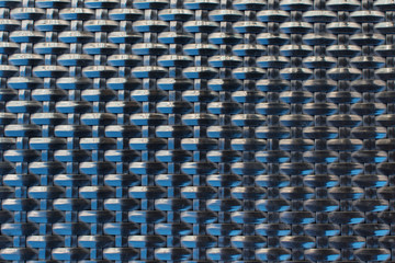 Close-up black plastic wattled grid texture pattern