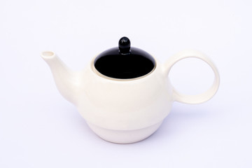 White teapot isolated on white background.