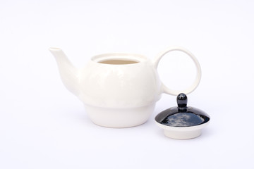 White teapot isolated on white background.