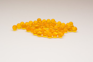 Omega-3 capsules on a white background. Healthcare concept.