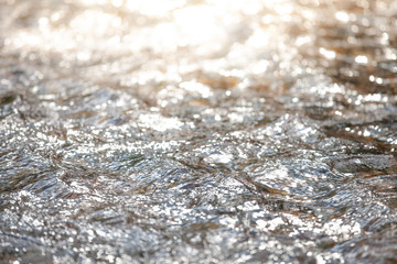 River surface. Reflecting the river from the sun.soft focus.