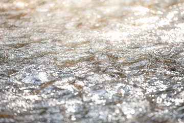 River surface. Reflecting the river from the sun.soft focus.