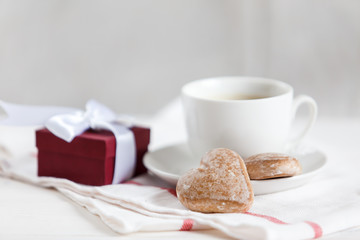 Small gift and cup of coffe