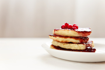 Stack of pancakes with berries