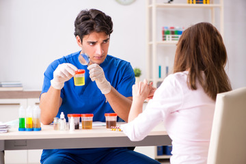 Patient visiting doctor for urine test