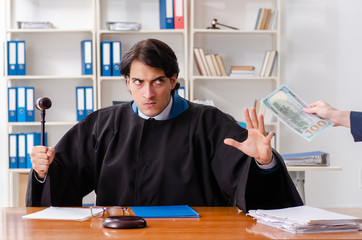 Young woman visiting male lawyer 