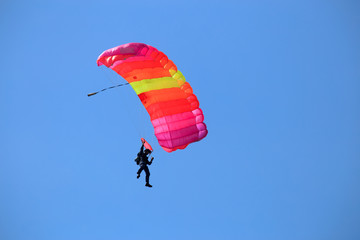 Soldiers show parachuting to allow children to watch on National Children's Day.