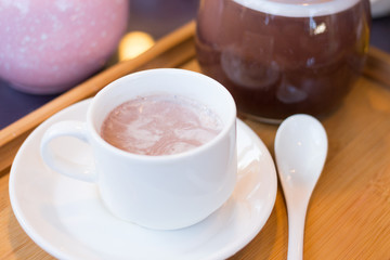 hot dark milk chocolate cup with teapot - 259854818