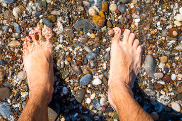Beautiful pebbles on the beach close up