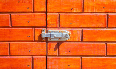 metal latch on wooden door