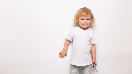 banner child playing with toy airplane against on a white background. concept dreams of flight