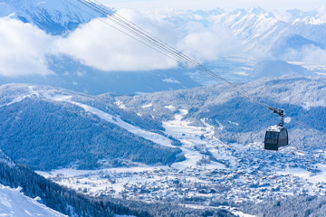 Winter landscape with snow covered Alps and aerial view of Seefeld in the Austrian state of Tyrol....