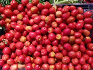 Tomatoes are sold in the market for selling fruits and vegetables.10