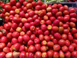 Tomatoes are sold in the market for selling fruits and vegetables.9