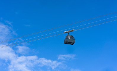 Ski gondola against blue sky in Seefeld, Austria