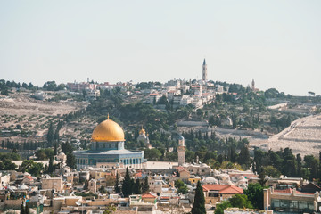 Jerusalem, Israel, aerial view of the golden dome of the Dome of the Rock, an Islamic shrine located on the Temple Mount in the Old City of Jerusalem. Ancient Jewish city shot at fine sunny day.
