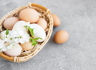 Basket with chicken eggs