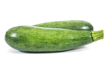 It is two of zucchini isolated on white background.Zucchini plant isolated