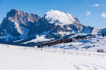 Fototapeta na wymiar Dream atmosphere and views. Winter on the Alpe di Siusi, Dolomites. Italy