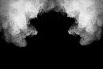 abstract powder splatted background,Freeze motion of color powder exploding throwing color powder,color glitter texture on black background.